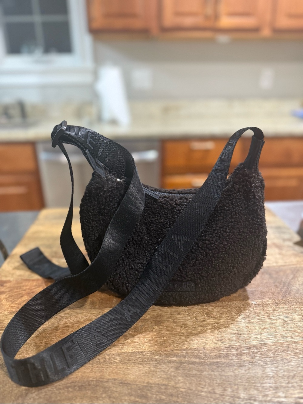 Athleta Black/Brown All About Sherpa Mini Crescent Crossbody Bag